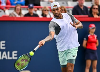 Nick Kyrgios of Australia hits a return during his victory over Sebastian Baez of Argentina at the ATP Montreal Masters tournament