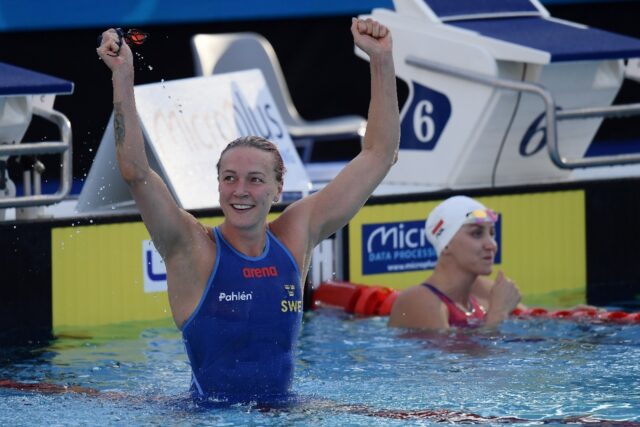 Sarah Sjoestroem celebrates her 50m freestyle final victory