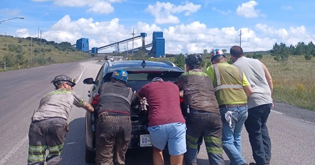 Stranded Tourist with Dead Electric Car Helped by West Virginia Coal Miners