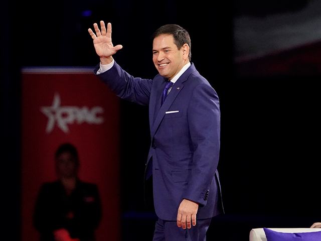 Sen. Marco Rubio, R-Fla., waves to supporters after speaking at the Conservative Political