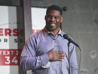 Herschel Walker, GOP candidate for the US Senate for Georgia, speaks at a primary watch pa