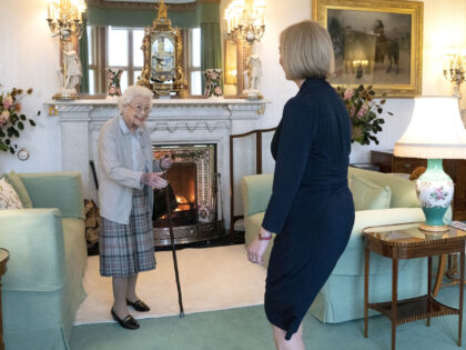 Britain's Queen Elizabeth II, left, welcomes Liz Truss during an audience at Balmoral