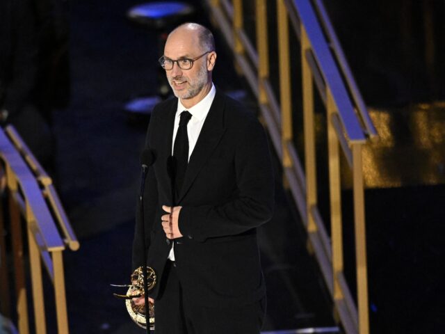 British screenwriter Jesse Armstrong accepts the award for Outstanding Writing For A Drama