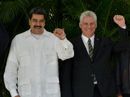 (L-R) Venezuelan President Nicolas Maduro and Cuban President Miguel Diaz-Canel pose for t