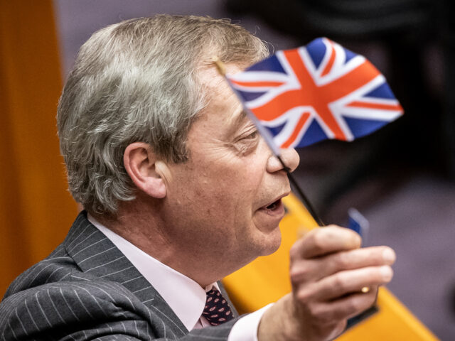 29 January 2020, Belgium, Brüssel: Nigel Farage (Brexite Party), waving a small Britain f