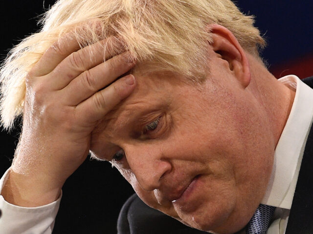 Britain's Prime Minister Boris Johnson gestures as he delivers his keynote speech on the f