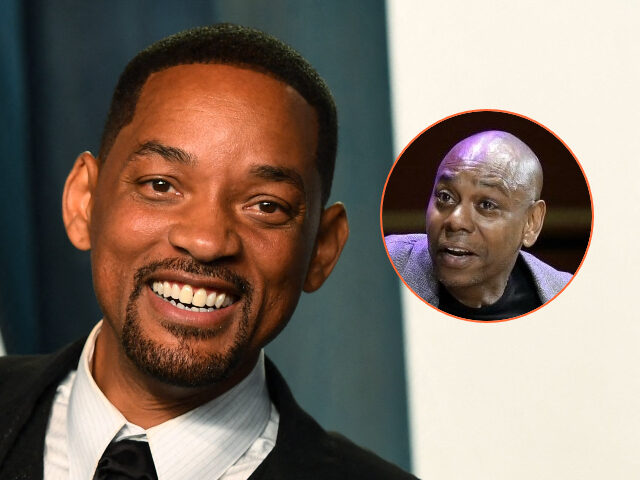 (INSET: Dave Chappelle) US actor Will Smith holds his award for Best Actor in a Leading Ro