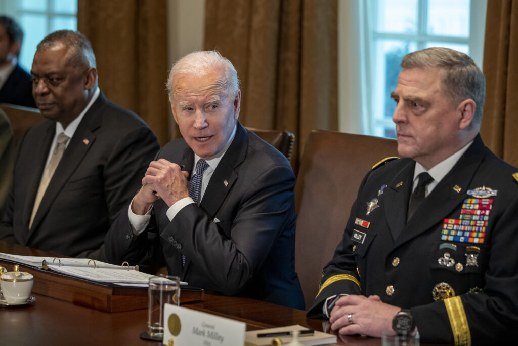 U.S. President Joe Biden, center, speaks beside Lloyd Austin, U.S. secretary of defense, left, and Mark Milley, chairman of the joint chiefs of staff, during a meeting in the Cabinet Room of the White House in Washington, D.C., U.S., on Wednesday, April 20, 2022. The Biden administration is preparing to announce another $800 million in weapons and support for Ukraine. Photographer: Tasos Katopodis/UPI/Bloomberg via Getty Images