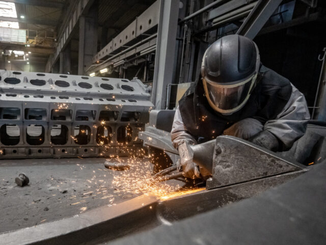KREFELD, GERMANY - APRIL 21: A worker deburrs a casting after the ductile iron casting process at the Siempelkamp Giesserei foundry on April 21, 2022 in Krefeld, Germany. The Siempelkamp foundry is one of many companies in Germany's manufacturing sector that would be acutely affected by a halt of Russian …