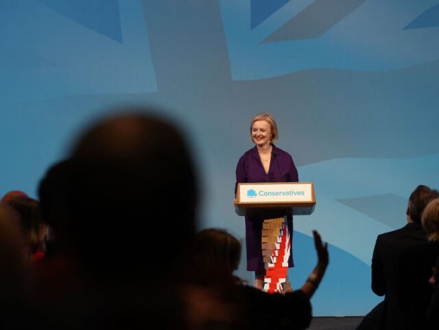 New Conservative Party leader and Britain's Prime Minister-elect Liz Truss delivers a