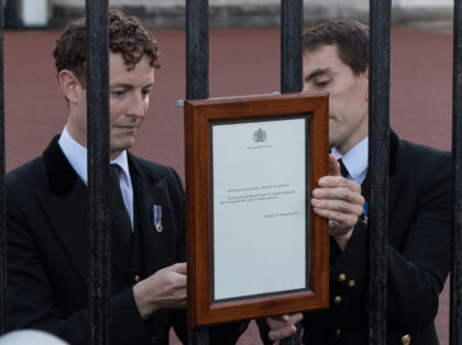 LONDON, UNITED KINGDOM - SEPTEMBER 08: Buckingham Palace staff attach a notice of the deat