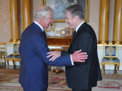 LONDON, ENGLAND - SEPTEMBER 10: King Charles III speaks with Labour leader Sir Keir Starme