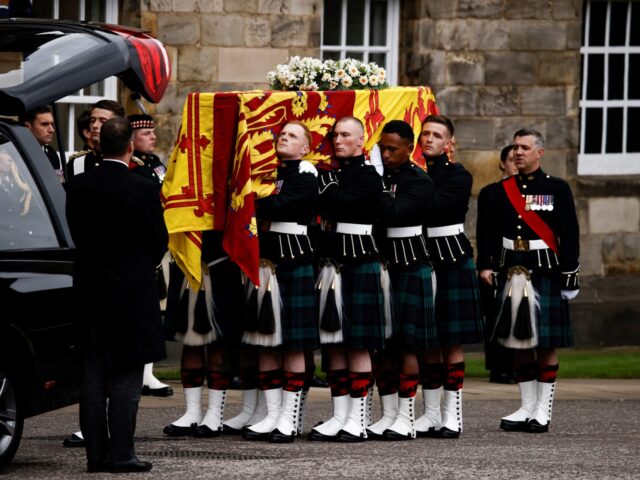 Pallbearers carry the coffin of late Britain's Queen Elizabeth II covered with the Ro