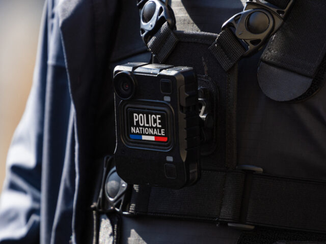 This photograph taken on September 11, 2022, shows a body-camera fixed on the protective vest of a member of the National Police during the visit of French far-right Rassemblement National (RN) leader and President of the party's parliamentary group Marine Le Pen to the Braderie of Henin-Beaumont, northern France. - …