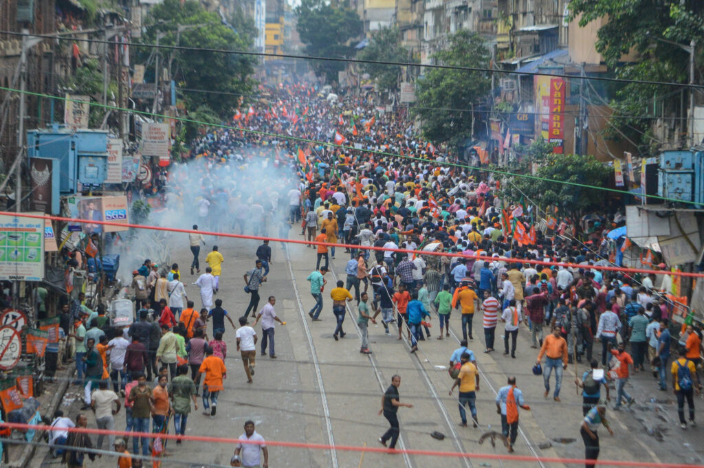 Smoke is seen from an exploding tear gas shell used by police during BJP protest in Kolkata , India , on 13 September 2022 .West Bengal BJP organized a protest rally to demand proper action against corruption committed by members of current government of West Bengal . (Photo by Debarchan Chatterjee/NurPhoto via Getty Images)