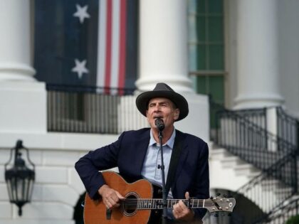 US singer-songwriter James Taylor performs during an event to celebrate the passage of the Inflation Reduction Act of 2022, on the South Lawn of the White House in Washington, DC, on September 13, 2022. (Photo by Mandel NGAN / AFP) (Photo by MANDEL NGAN/AFP via Getty Images)