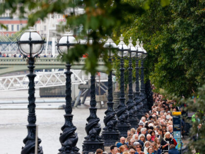 Members of the public queue to see Queen Elizabeth II lying in state in Westminster Hall, in London, UK, on Thursday, Sept. 15, 2022. With hundreds of thousands of people expected, the government set up a queue route from Southwark Park, along the river Thames on the South Bank, across …