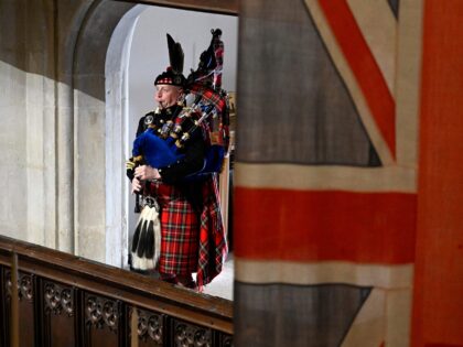 Pipe Major Paul Burns of the Royal Regiment of Scotland helps to close Queen Elizabeth II state funeral with a rendition of the traditional piece Sleep, Dearie, Sleep at Westminster Abbey in London on September 19, 2022. (Photo by Gareth Cattermole / POOL / AFP) (Photo by GARETH CATTERMOLE/POOL/AFP via …