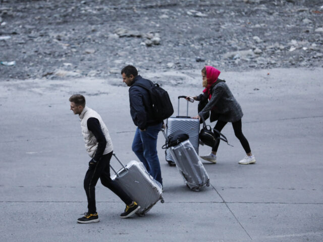 STEPANTSMINDA, GEORGIA - SEPTEMBER 27: Russians are seen attempting to leave their country