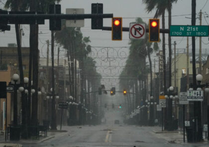 TOPSHOT - Wind and rain pick up in the Ybor City neighborhood ahead of Hurricane Ian making landfall on September 28, 2022 in Tampa, Florida. - Ian intensified to just shy of catastrophic Category 5 strength Wednesday as its heavy winds began pummelling Florida, with forecasters warning of life-threatening storm …