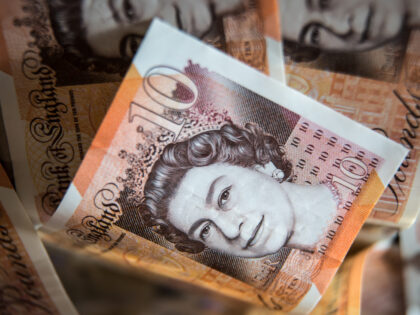 BRISTOL, UNITED KINGDOM - JANUARY 22: In this photo illustration Sterling British Pound GBP bank notes are arranged, on January 22, 2022 in Bristol, England. The UK is currently facing a cost of living crisis, as inflation hits a near-30-year high and rising energy bills will squeeze household incomes still …