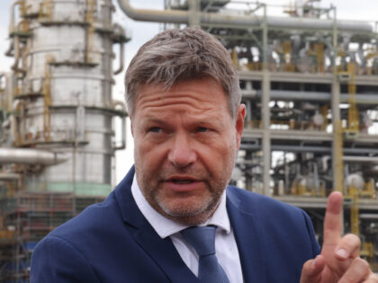 LEUNA, GERMANY - MAY 16: German Economy and Climate Action Minister Robert Habeck speaks to journalists while standing in front of the TotalEnergies Leuna oil refinery during a visit to the Leuna Refinery and Chemical Park on May 16, 2022 in Leuna, Germany. The Leuna oil refinery, which is owned …