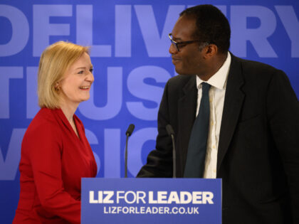 LONDON, ENGLAND - JULY 14: Secretary of State for Business, Energy and Industrial Strategy Kwasi Kwarteng (R) intridcues Conservative leadership candidate Liz Truss (L) as she launches her campaign to become the next Prime Minister on July 14, 2022 in London, England. Liz Truss, the current Foreign Secretary, survived the …