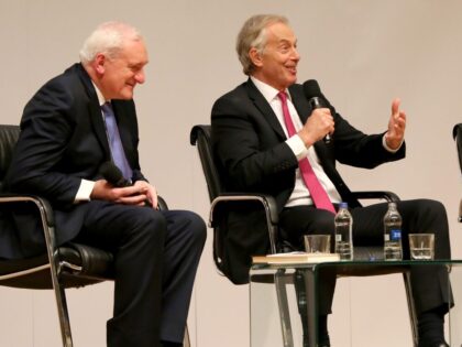 Former Irish Premier Bertie Ahern (L) former British Prime Minister Tony Blair (C) and former US president Bill Clinton attend a special event to mark the twentieth anniversary of the Good Friday Agreement, at Queen's University in Belfast on April 10, 2018. Twenty years after Northern Ireland's landmark peace agreement, …