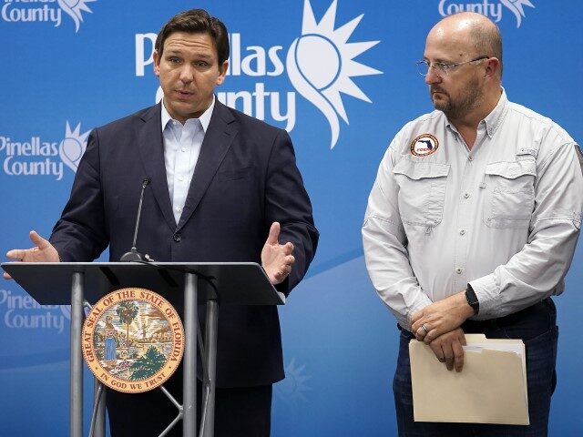 Ron DeSantis and Kevin Guthrie, director of the Florida Division of Emergency Management. Florida Gov. Ron DeSantis, left, speaks as he stands with Kevin Guthrie, director of the Florida Division of Emergency Management, during a news conference, Monday, Sept. 26, 2022, in Largo, Florida. DeSantis was keeping residents updated on …
