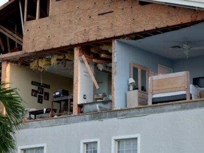 A wall of a condo was torn off as hurricane Ian passed through on September 30, 2022, in Fort Myers, Florida. The hurricane brought high winds, storm surge and rain to the area causing severe damage. (Joe Raedle/Getty Images)