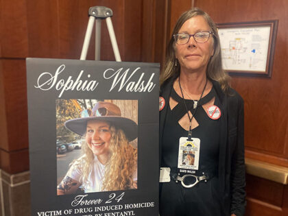 Barbara Walsh with photo of late daughter, September 15, 2022