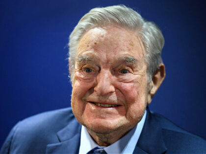 Hungarian-born US investor and philanthropist George Soros smiles after delivering a speec