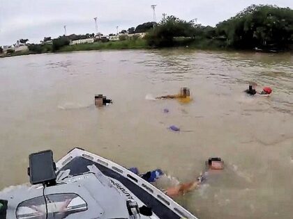 Border Patrol agents rescue a group of five migrant in the Rio Grande. (Video Screenshot: U.S. Border Patrol/Del Rio Sector)