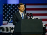 Pete Buttigieg, ‘Amtrak Joe’ Biden Talk Electric Cars at Auto Show While Rail Strike Looms