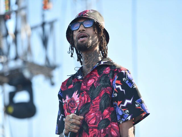 ANAHEIM, CALIFORNIA - AUGUST 11: Rapper PnB Rock performs onstage during the 92.3 Real Str