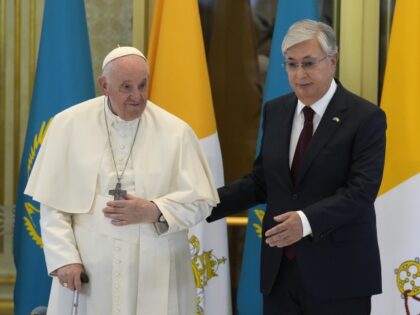 Kazakhstan Pope Pope Francis, left, meets the Kazakhstan's President Kassym-Jomart Tokayev as he arrives at Nur-Sultan's International airport in Nur-Sultan, Kazakhstan, Tuesday, Sept. 13, 2022. Pope Francis begins a 3-day visit to the majority-Muslim former Soviet republic to minister to its tiny Catholic community and participate in a Kazakh-sponsored conference …