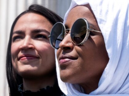 UNITED STATES - JULY 15: Rep. Ilhan Omar, D-Minn., right, and Rep. Alexandria Ocasio-Cortez, D-N.Y., attend a rally on the steps of the U.S. Capitol before the House voted on the Womens Health Protection Act and the Ensuring Womens Right to Reproductive Freedom Act, on Friday, July 15, 2022. (Tom …