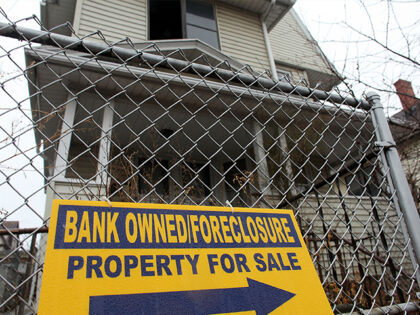 BRIDGEPORT, CT - MARCH 12: A sign is displayed in front of a foreclosed home on March 12, 2010 in Bridgeport, Connecticut. A new report by RealtyTrac Inc. announced that the number of foreclosed homes in Connecticut, one of the nation's wealthiest states, is up 3.4 percent from January to …