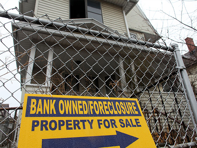 BRIDGEPORT, CT - MARCH 12: A sign is displayed in front of a foreclosed home on March 12,