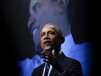 Former President Barack Obama speaks during a memorial service for former Senate Majority