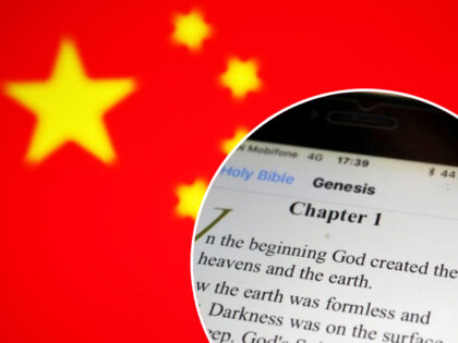Paper Bible and digital Bible app on smartphone. The Old Testament. Genesis. (Photo by: Godong/Universal Images Group via Getty Images)