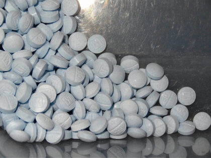 Blinken - FILE - This undated file photo provided by the U.S. Attorneys Office for Utah and introduced as evidence at a trial shows fentanyl-laced fake oxycodone pills collected during an investigation. Congress has voted to temporarily extend a sweeping tool that has helped federal agents crack down on drugs …