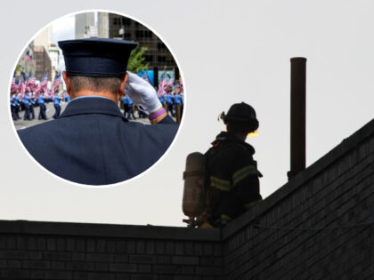 NEW YORK, NEW YORK - SEPTEMBER 11: An Member of the New York City Fire Department salutes