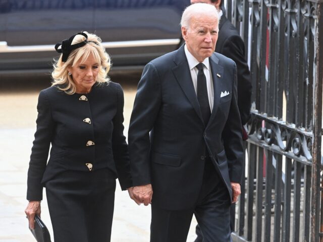 US President Joe Biden and first lady Jill Biden arrive to take their seats inside Westmin