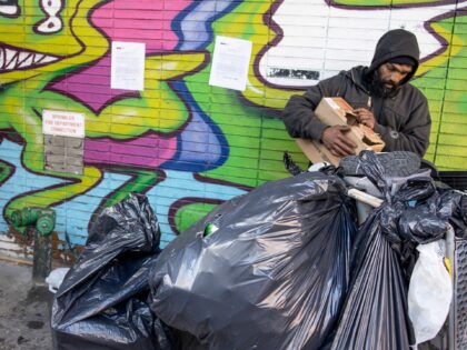 NEW YORK, NEW YORK - APRIL 11: Neil Singh, a homeless man who has been living on Eldridge street for almost two years, is forced to dismantle his structure and move after receiving a notice from the city Department of Sanitation as part of Mayor Adams policy to remove homeless …