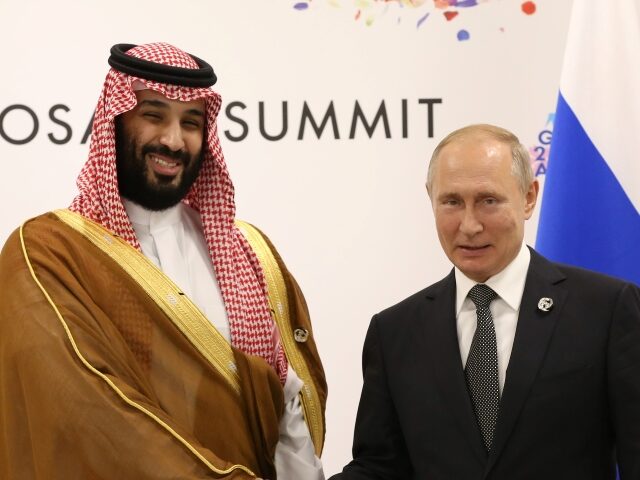 OSAKA, JAPAN - JUNE 29: (RUSSIA OUT) Russian President Vladimir Putin (R) and Saudi Arabia's Prince and Defence Minister Mohammad bin Salman al Saud (L) attend their bilateral talks at the G20 Osaka Summit 2019, on June 29, 2019 in Osaka, Japan. Vladimir Putin has arrived to Japan to partcipate …