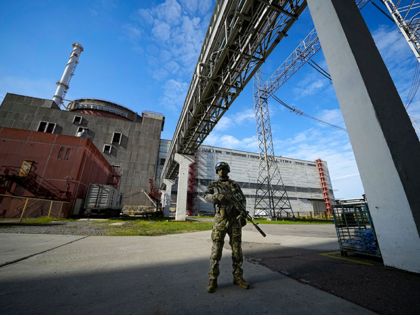 A Russian serviceman guards in an area of the Zaporizhzhia Nuclear Power Station in territ