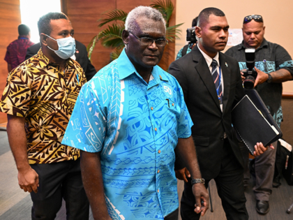 Prime minister of the Solomon Island Manasseh Sogavare (C) arrives for the opening remarks of Pacific Islands Forum (PIF) in Suva on July 12, 2022 (Photo by William WEST / AFP)