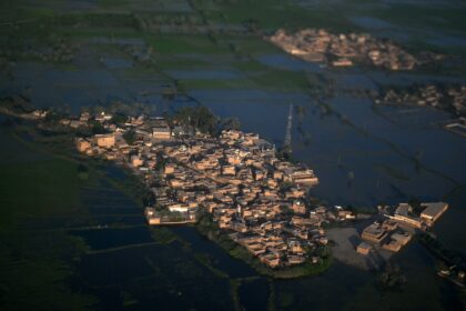 An aerial photograph showing a flooded area on the outskirts of Sukkur, Sindh province