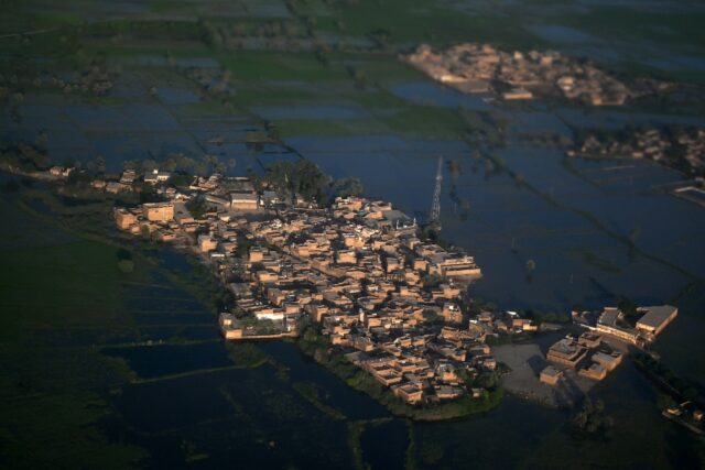 An aerial photograph showing a flooded area on the outskirts of Sukkur, Sindh province